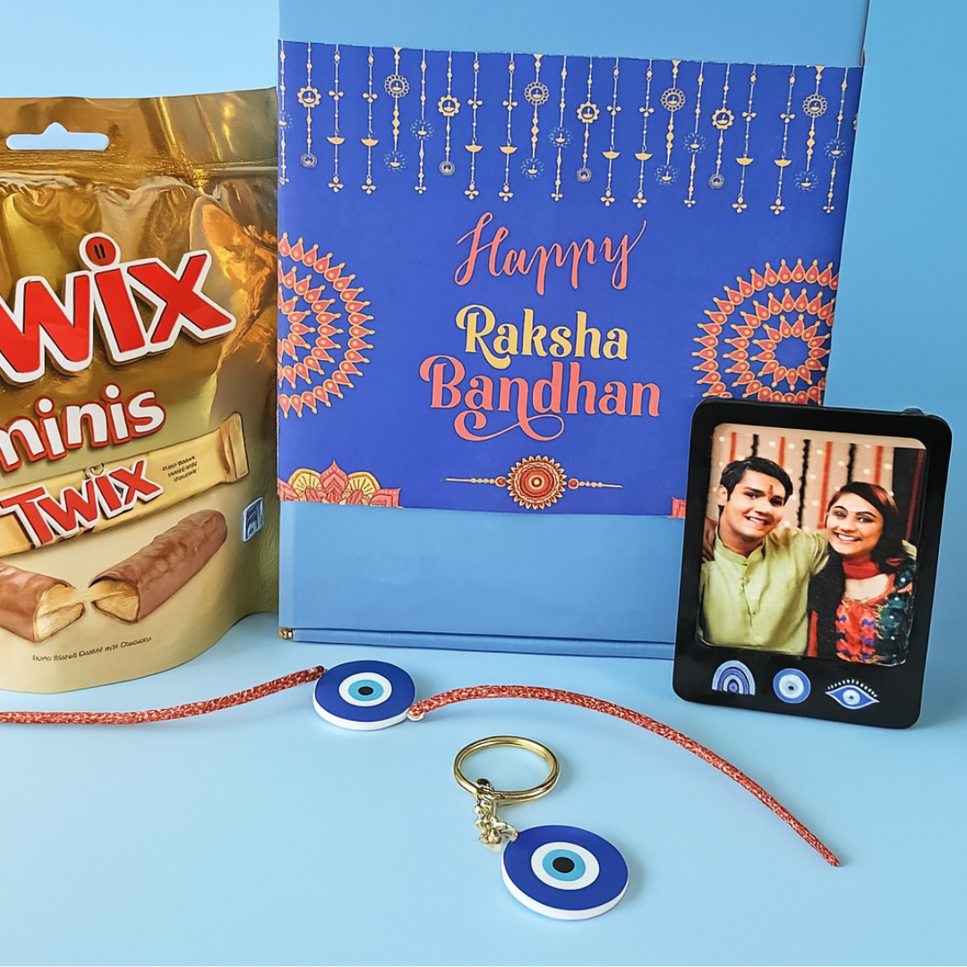 Stylish Rakhi Gift Sets for Brother – Evil Eye Rakhi, Photo Magnet, Keychain & Chocolate in Festive Box