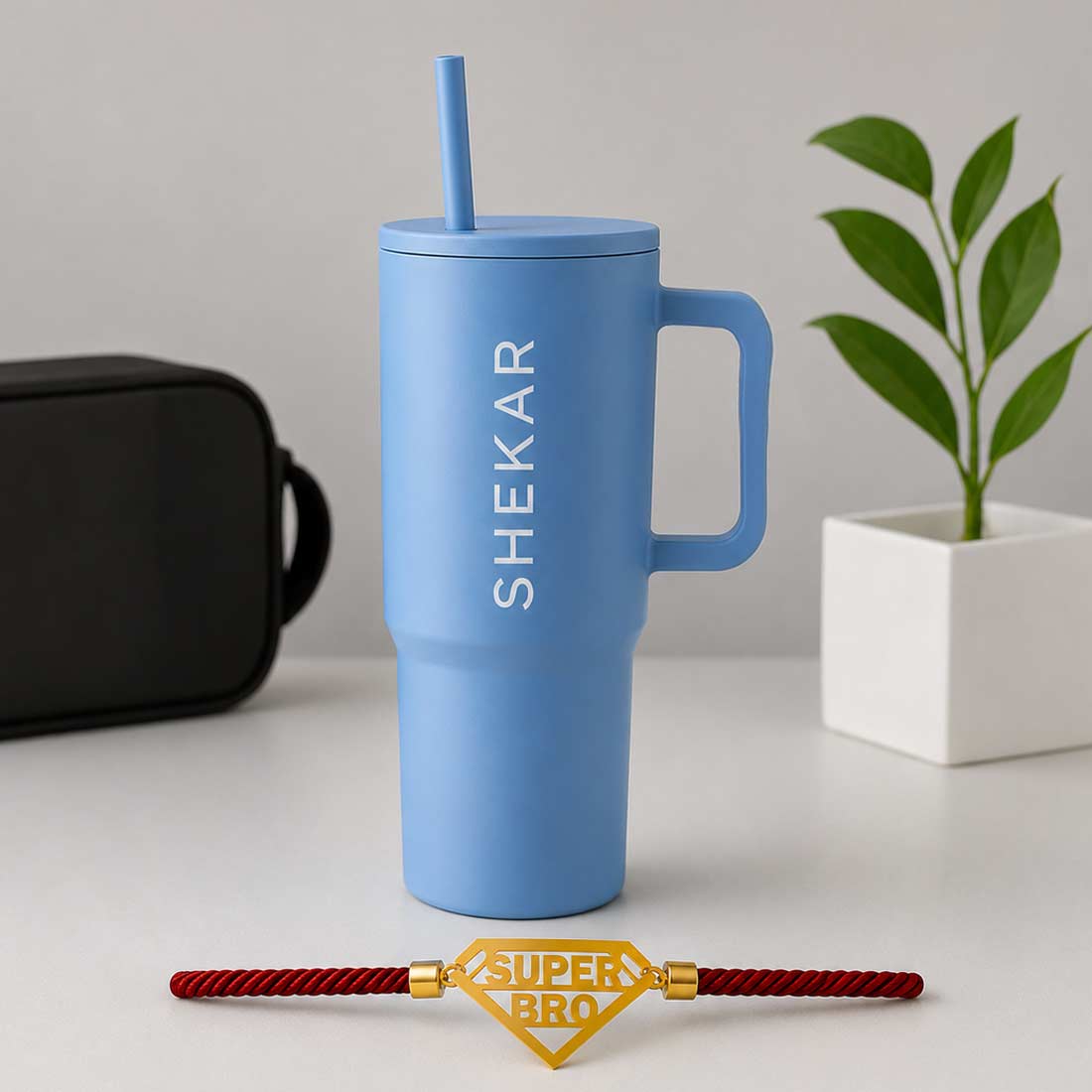 Customized Raksha Bandhan Gift Set for Brother – 1200ml Coffee Tumbler & Custom Acrylic Name Rakhi