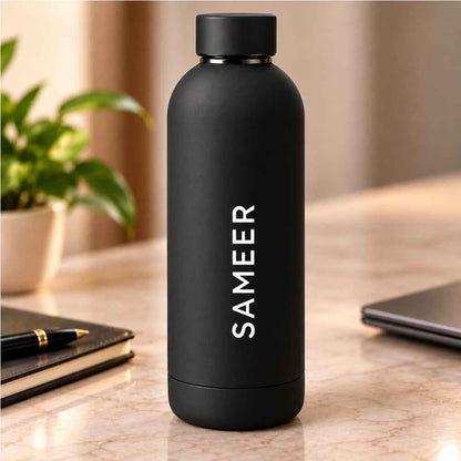 "Customized 500ml matte black stainless steel double wall vacuum insulated water bottle with printed name."
