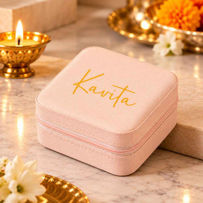 Personalised compact square pink jewelry storage box with gold foil script name customization."
