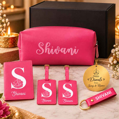 Personalized travel gift set with pink passport cover, luggage tags, pouch and keychain
